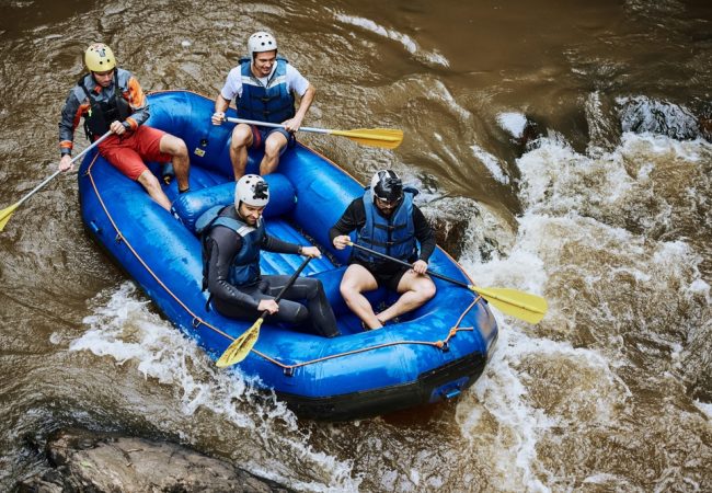 Raft,,River,And,People,In,Boat,With,Rocks,For,Fun